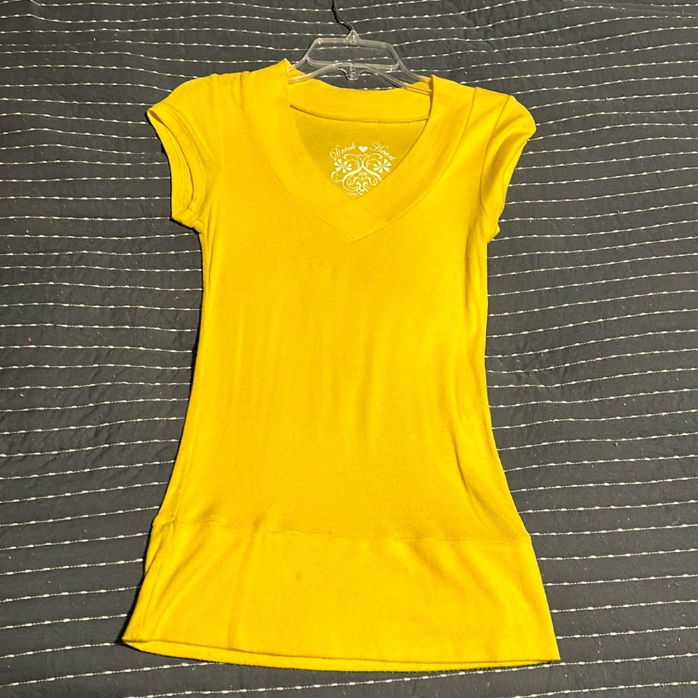 Bright yellow soft fitted tee.